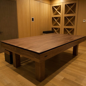 Walnut pool table with a ping pong and dining coversion top