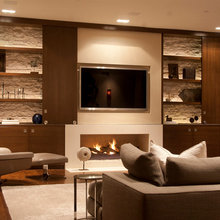Concealed TV above fireplace