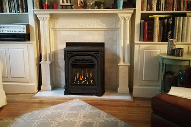 Living room - victorian living room idea in Richmond with a standard fireplace and a tile fireplace