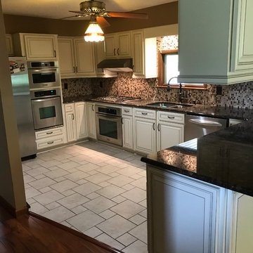 antique white cabinet refacing with brown glazing