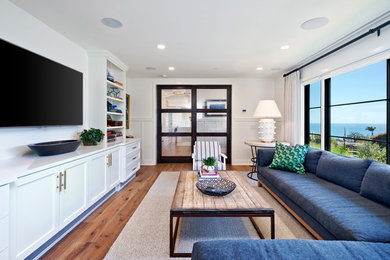 Inspiration for a transitional family room remodel in Orange County