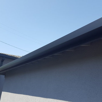 Black Gutters and Downspouts Contemporary Home, West Los Angeles