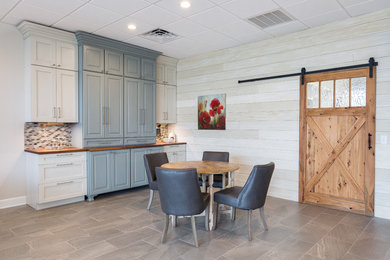 Great room - large transitional porcelain tile and brown floor great room idea in Other with white walls and no fireplace