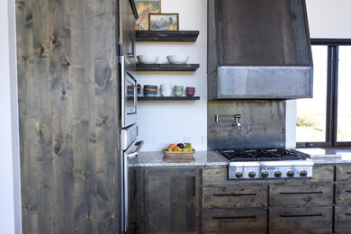Mountain style kitchen photo in Other with stainless steel appliances