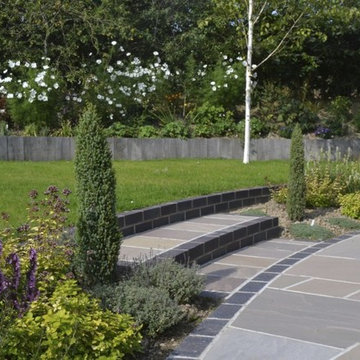 Stone/ brick etc landscape elements.