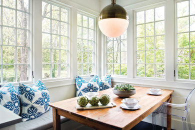 Inspiration for a transitional kitchen/dining room combo remodel in Burlington with white walls