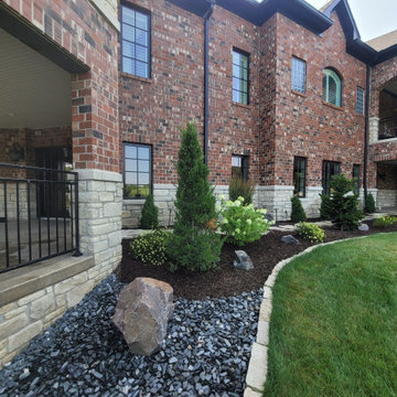 Estate Poolside Landscape & Hardscape Retreat with Custom Waterfeature