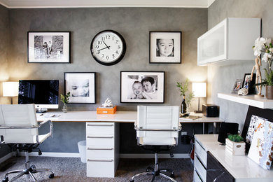 Study room - small modern freestanding desk carpeted study room idea in DC Metro with gray walls