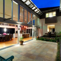Outdoor courtyard and terrace area looking up at Breezway Louvre Windows - Windows