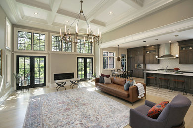 Example of a huge eclectic open concept living room design in Chicago with a ribbon fireplace