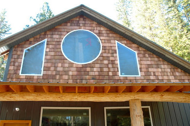 Example of a mountain style exterior home design in Calgary