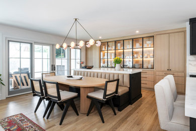 Great room - transitional medium tone wood floor and brown floor great room idea in Cleveland with white walls