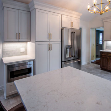 Two Tone Kitchen with Wood Stained and Light Beige Cabinets