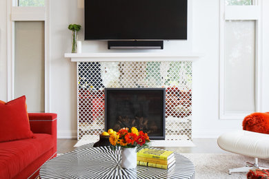 Example of a large eclectic open concept dark wood floor family room design in New York with white walls, a standard fireplace, a tile fireplace and a wall-mounted tv