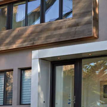 Detail shot of the bay window and entry canopy