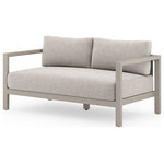 Four Hands - Sonoma Outdoor Sofa, Weathered Grey,Stone Grey / 60" - Modern materials ready a stylish silhouette for the outdoors. Grey teak forms a clean two-seat frame for UV-resistant and water-repellent Sunproof fabric in a textural navy. Back straps add intrigue. Cover or store indoors during inclement weather and when not in use.