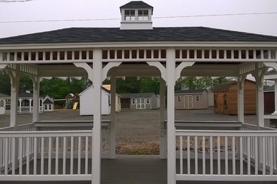 Design ideas for a backyard outdoor basketball/tennis/multi-game court in New York.