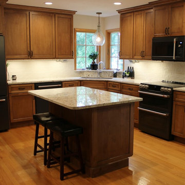 Maple Kitchen With Black and Gold Accents