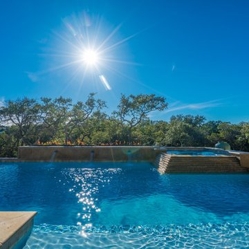 Contemporary Pool with Firewall and Scuppers in San Antonio, TX  Siggi Ragnar-Ph