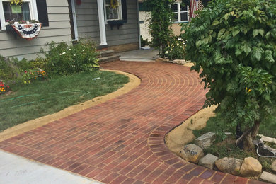 Photo of a traditional brick garden path in Cleveland.