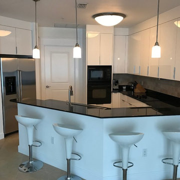Modern Kitchen Remodel Done With High Gloss Acrylic Doors