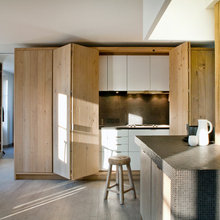 9 Cleverly Concealed Kitchens Open Up