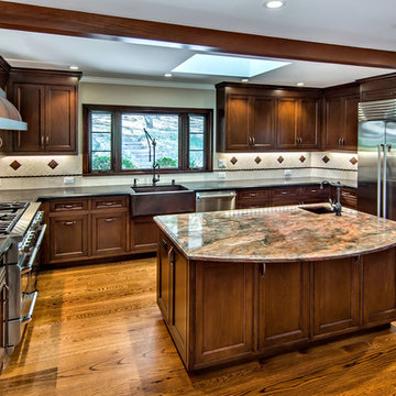 Cherry kitchen with copper hood and copper sinks