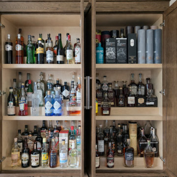 Custom White Oak Floor-to-Ceiling Storage Cabinet | Jacksonville Custom Cabinetr