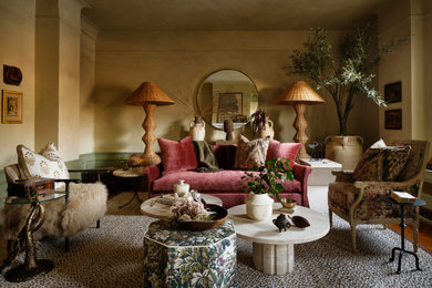 Example of a transitional living room design in New York