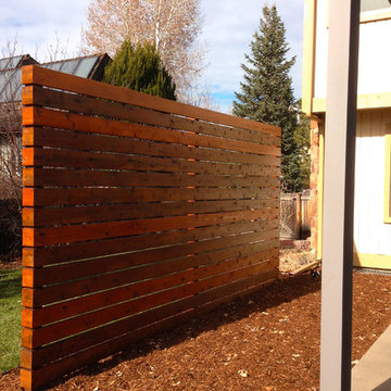 Cedar Slat Wall Creates a Privacy Screen for Modern Patio