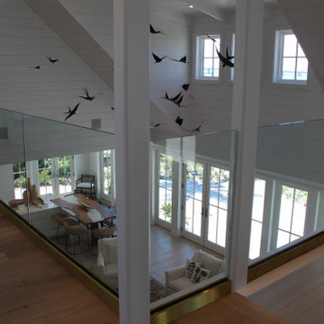 Glass Balustrade with Aluminum Base Rail Finished with Satin Brass Cladding