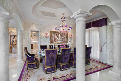 Dining room - eclectic marble floor dining room idea in Miami with beige walls