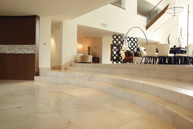 Inspiration for a contemporary hallway in Other with marble floors.