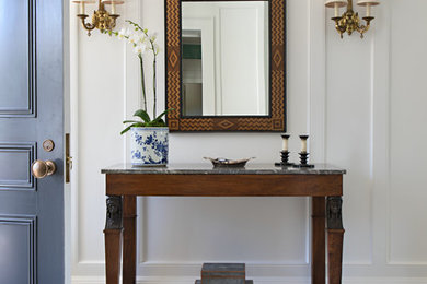 Design ideas for a traditional entryway in Santa Barbara with white walls, marble floors and multi-coloured floor.
