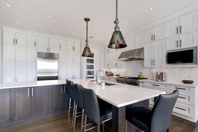 This is an example of a transitional kitchen in Calgary.