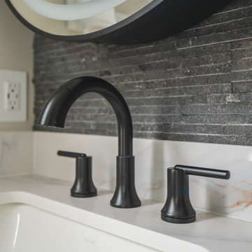 Bathroom Remodel in Sterling, VA Tub, glass shower, double vanity, stone wall