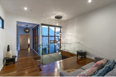 Photo of a modern family room in Brisbane.