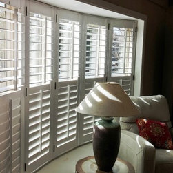 Crestview Shutters on Bow Window - Interior Shutters