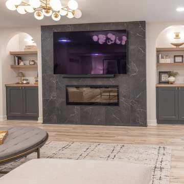 Warm & Inviting Basement Retreat with Custom Bar + Entertainment Center