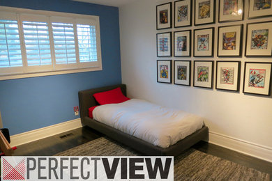 Mid-sized trendy dark wood floor bedroom photo in Toronto with no fireplace