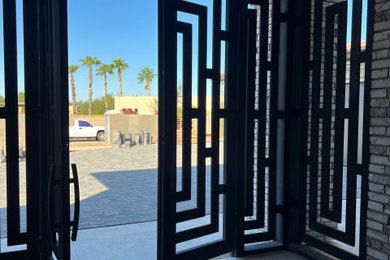 Beach style entryway photo in Phoenix