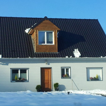 Maison traditionnelle avec balcon en ossature bois