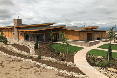 Large mountain style exterior home photo in Denver