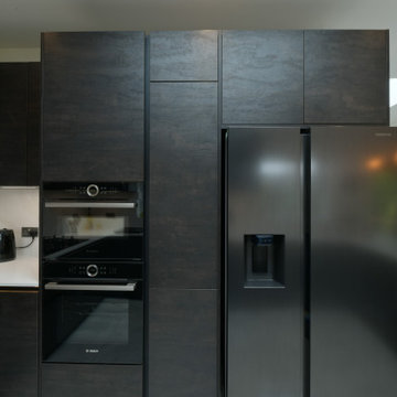 Black and white compact kitchen with elegant design and funtional element