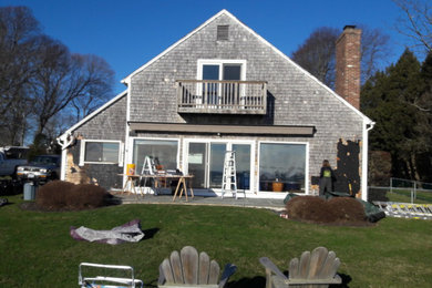 Example of a wood exterior home design in Providence