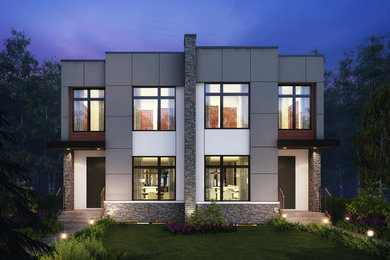Inspiration for a mid-sized modern gray two-story stucco duplex exterior remodel in Calgary with a shingle roof