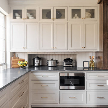 Painted Inset Cabinetry and Leathered Granite in a Transitional Edmond Kitchen
