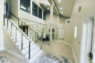 Example of a trendy home design design in Tampa