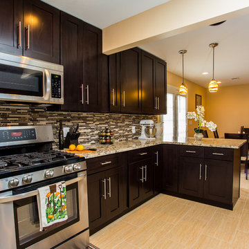 Contemporary Espresso Kitchen Remodel with Granite Counters & Mosaic Backsplash
