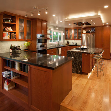 3ft wide peninsula borders kitchen and family room provides large work surface